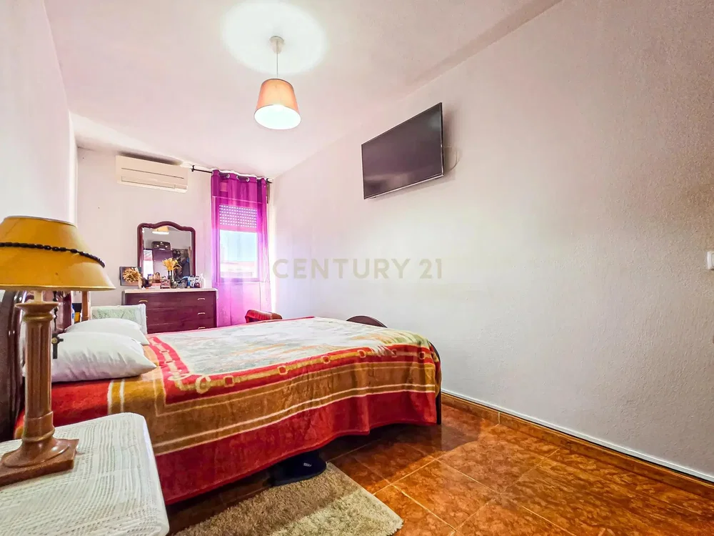 Bedroom; tile floor, natural light