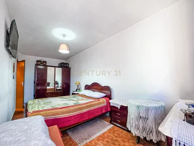 Bedroom; tile floor, natural light