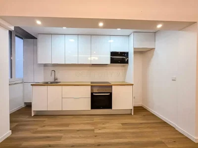 Kitchen; kitchen appliances, wood floor, natural light