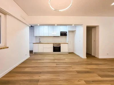 Kitchen; kitchen appliances, wood floor, natural light