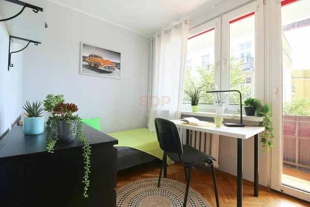 Bedroom; natural light, wood floor