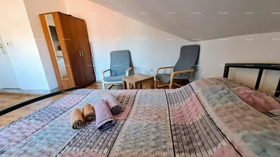 Slaapkamer; natuurlijk licht, houten vloer