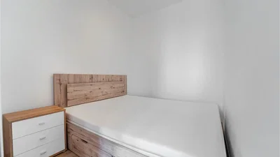 Bedroom; natural light, wood floor