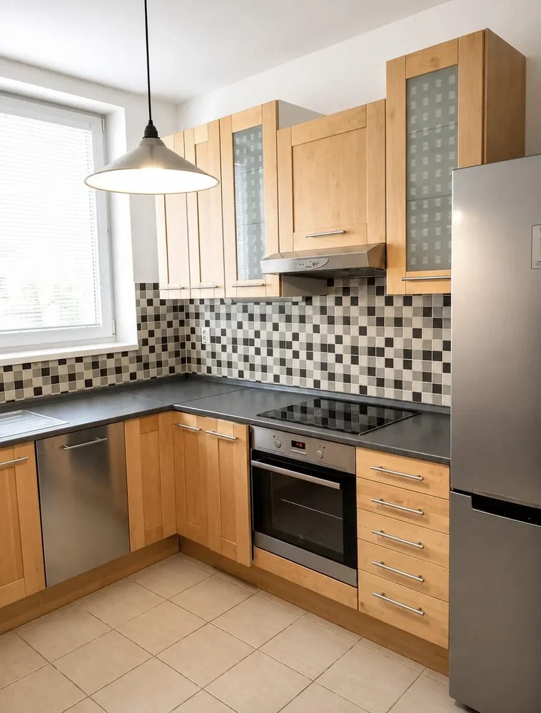 Kitchen; kitchen appliances, tile floor, natural light