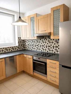 Kitchen; kitchen appliances, tile floor, natural light