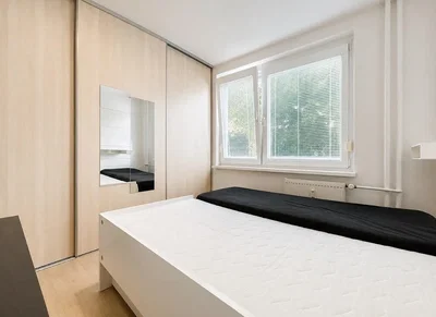 Bedroom; natural light, wood floor