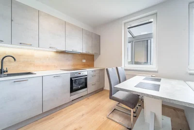 Kitchen; kitchen appliances, wood floor, natural light