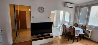 Living room; tile floor, natural light, wood floor