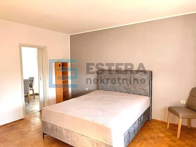 Bedroom; natural light, wood floor
