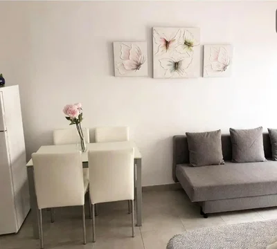 Living room; tile floor, natural light, modern style
