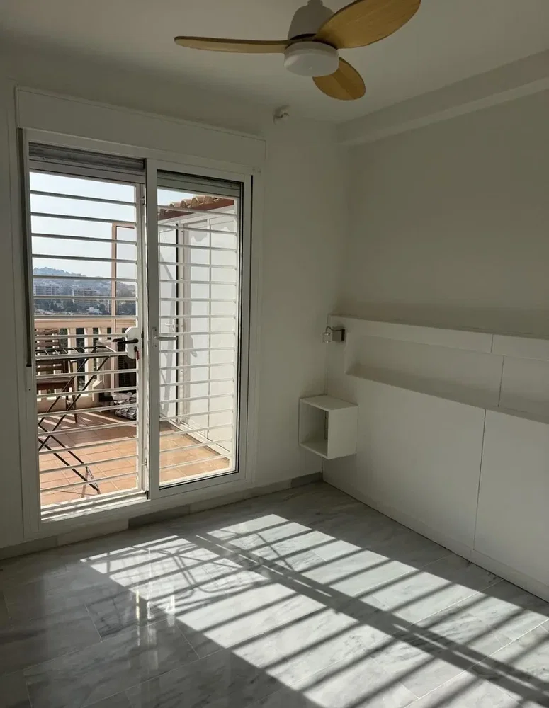 Bedroom; natural light, tile floor, view