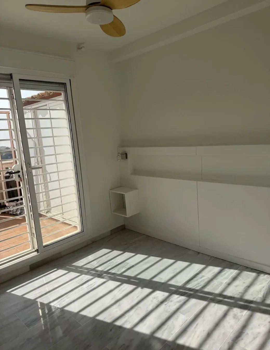 Bedroom; natural light, tile floor