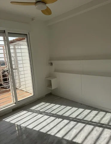Bedroom; natural light, tile floor