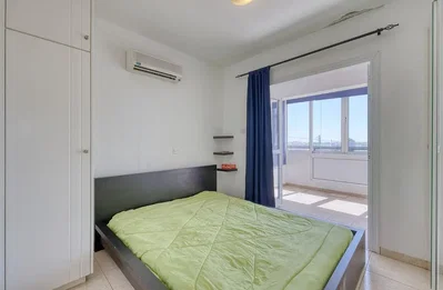 Bedroom; natural light, tile floor