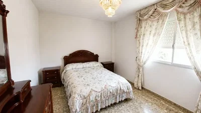 Camera da letto; pavimento in legno, luce naturale