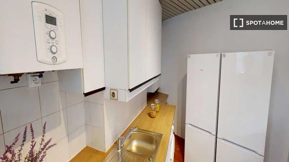 Kitchen; kitchen appliances, tile floor, wood floor