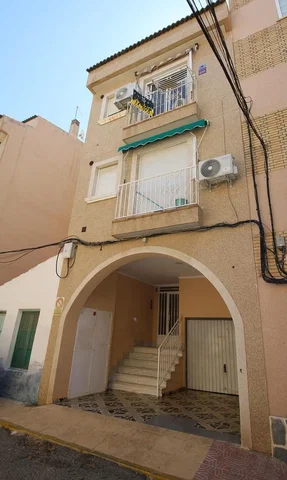 House and surroundings; tile floor