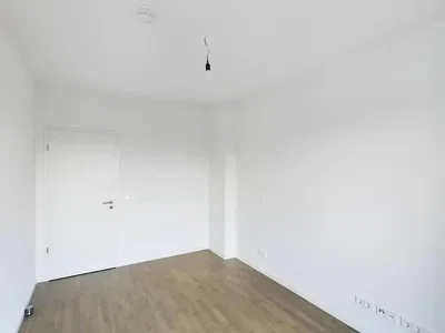 Bedroom; wood floor, natural light