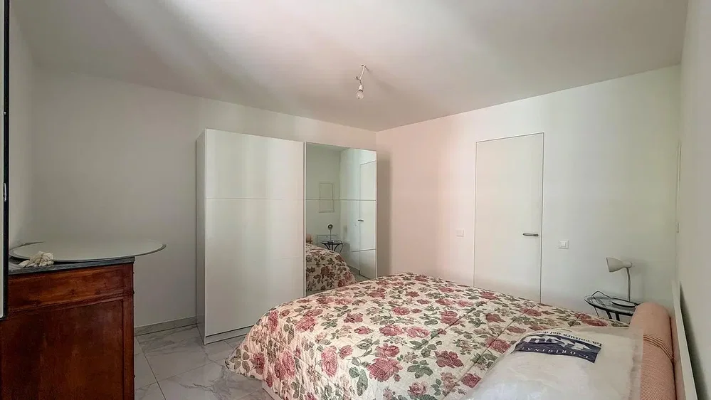 Bedroom; tile floor, natural light