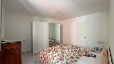 Bedroom; tile floor, natural light