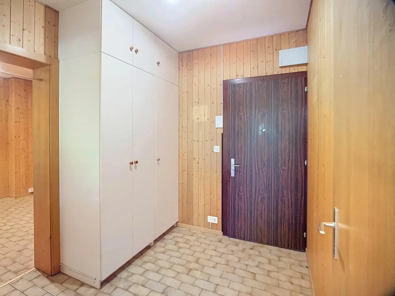 Vestiaire; parquet, poutres en bois