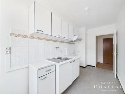 Kitchen; kitchen appliances, tile floor, needs renovation, natural light