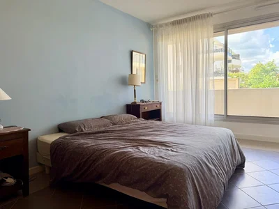 Bedroom; tile floor, natural light, view