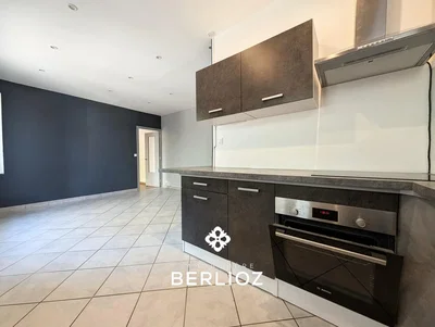 Kitchen; kitchen appliances, tile floor, natural light