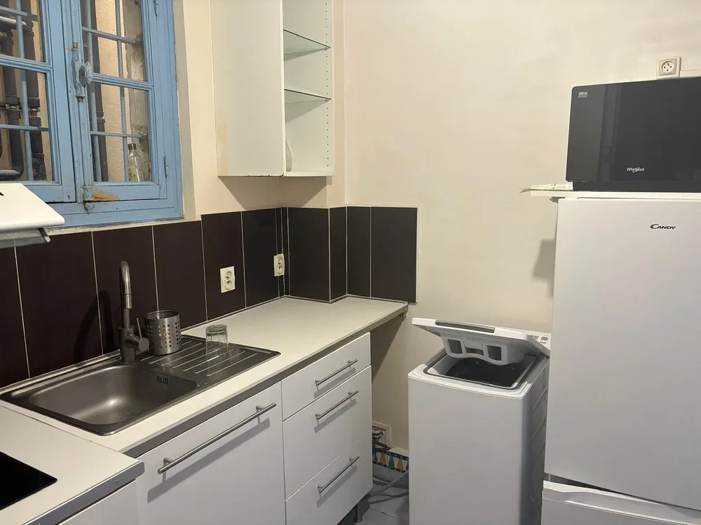 Kitchen; kitchen appliances, tile floor, needs renovation