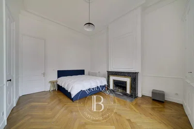 Bedroom; wood floor, fireplace, natural light