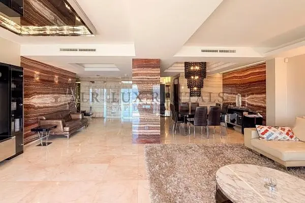Living room; tile floor, high ceiling, natural light, modern style