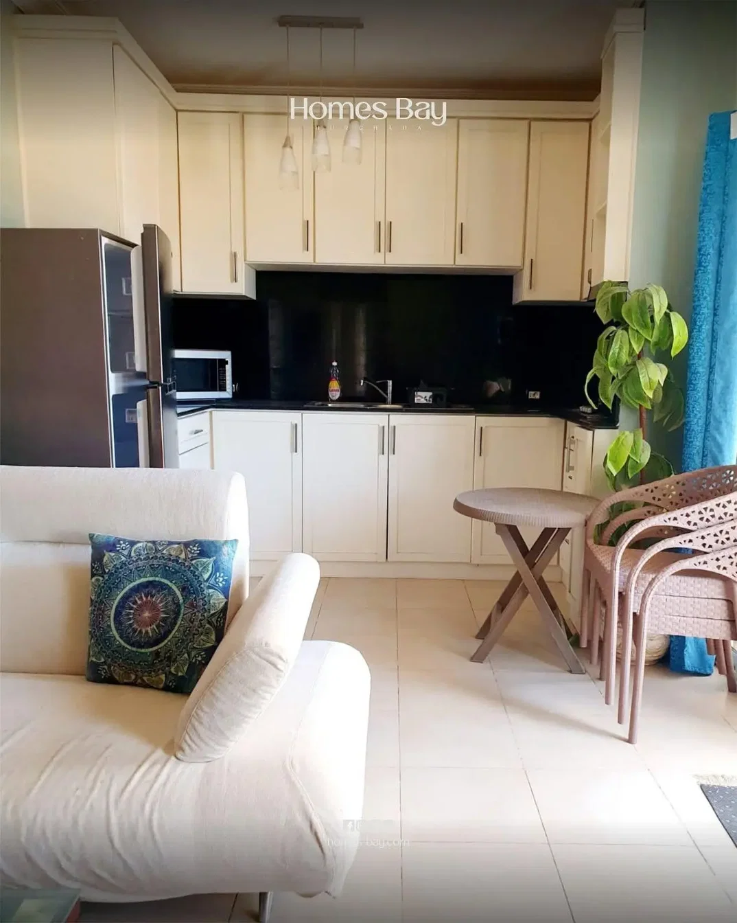 Kitchen; kitchen appliances, tile floor, natural light