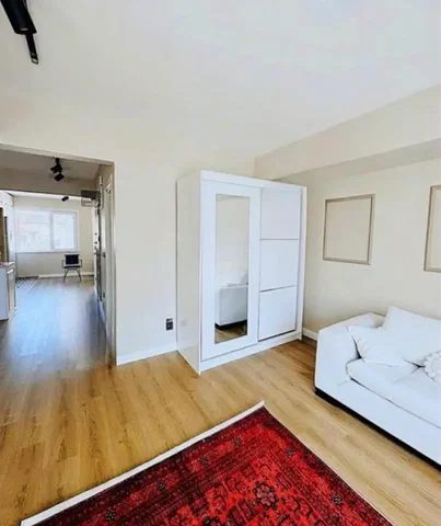 Living room; wood floor, natural light
