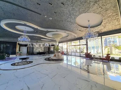 Salon; carrelage, hauteur sous plafond, lumière naturelle