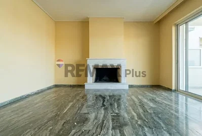 Living room; fireplace, tile floor, natural light