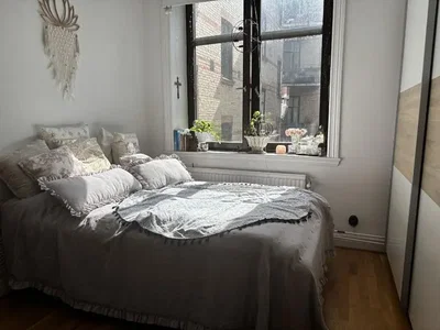 Bedroom; wood floor, natural light