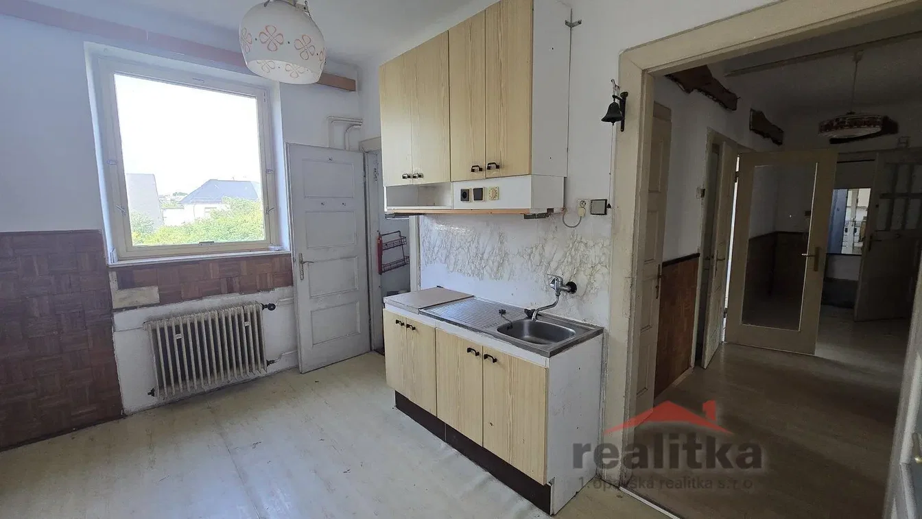 Kitchen; needs renovation, natural light