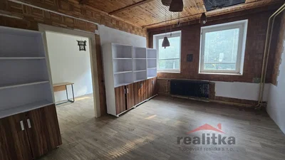 Living room; wood beams, wood floor, natural light
