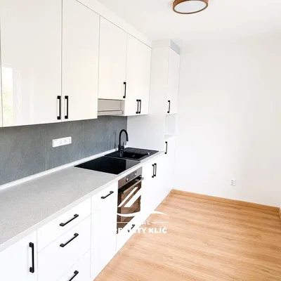 Kitchen; kitchen appliances, wood floor, renovated, natural light