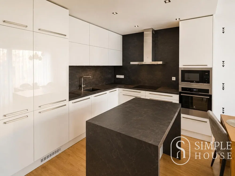 Kitchen; kitchen appliances, wood floor, natural light, modern style, renovated