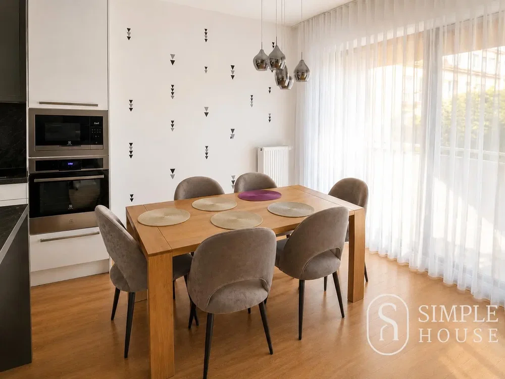 Kitchen; kitchen appliances, wood floor, natural light, modern style