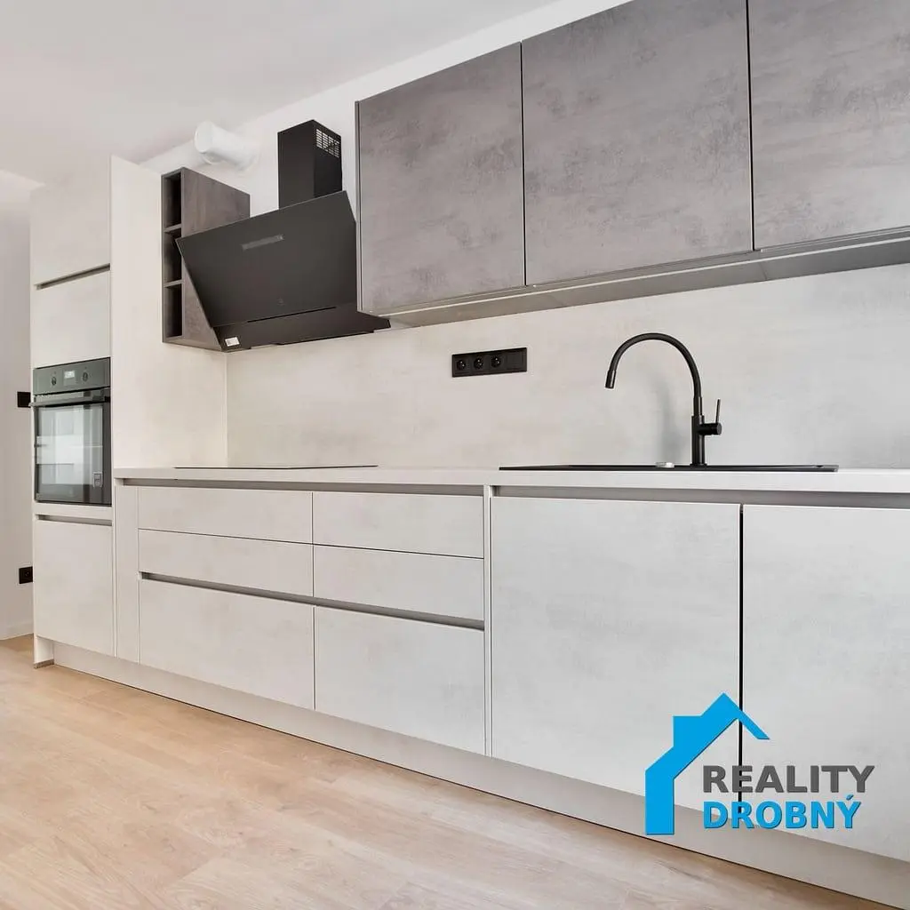 Kitchen; kitchen appliances, wood floor, renovated, natural light
