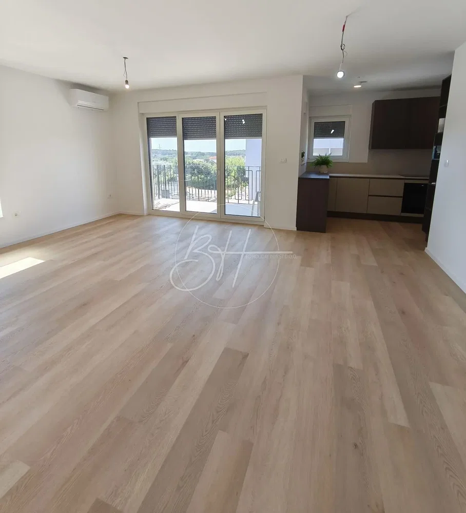Living room; wood floor, natural light, view