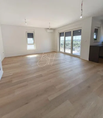 Living room; wood floor, natural light, view