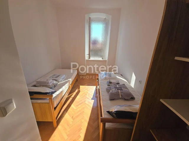 Bedroom; wood floor, natural light