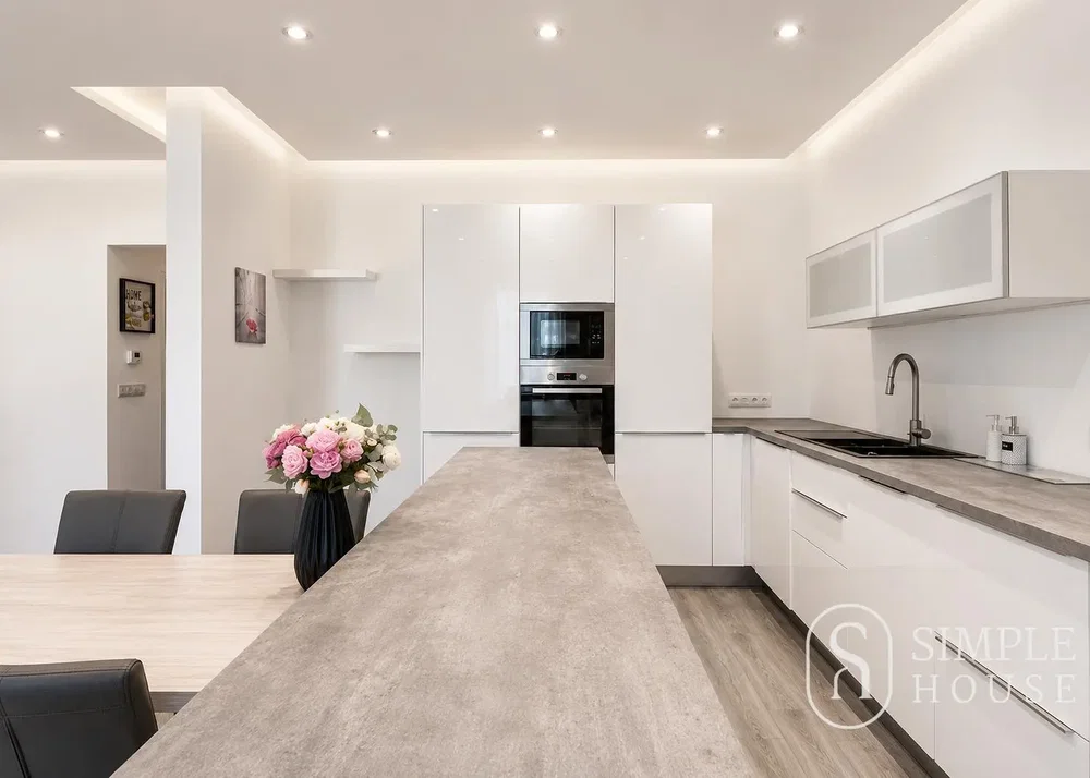 Kitchen; kitchen appliances, wood floor, renovated, natural light