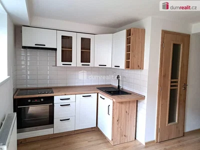 Kitchen; kitchen appliances, wood floor, natural light