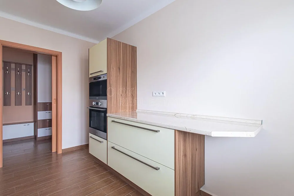 Kitchen; kitchen appliances, wood floor, renovated, natural light