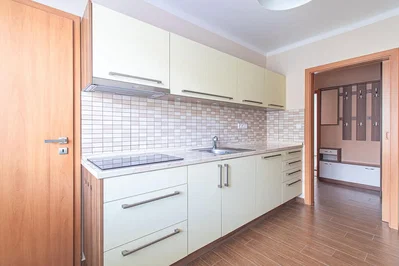 Kitchen; kitchen appliances, tile floor, natural light