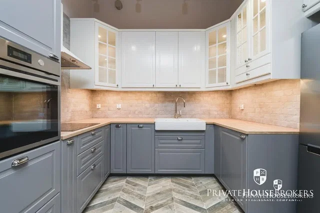 Kitchen; kitchen appliances, tile floor, renovated, natural light